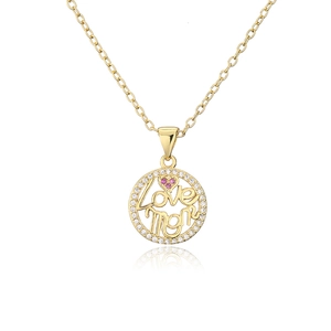Detailed shot of golden Love Mom pendant necklace with pink and clear zircon stones