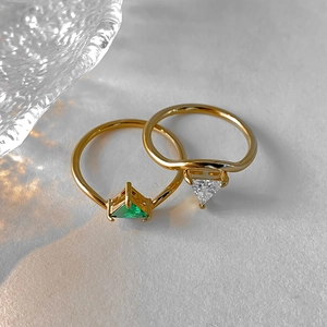 Set of two minimalist 18k gold plated stainless steel rings with green and white zircons