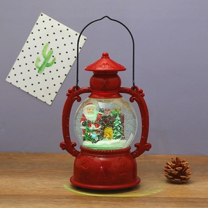 Christmas musical snow globe lantern with Santa Claus figurine and LED lighting effect