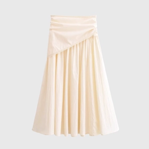 High-waisted ivory midi skirt featuring asymmetric pleats and delicate lace trim details