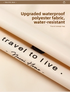 Close-up of waterproof polyester travel organizer bag in cream beige with artistic typography
