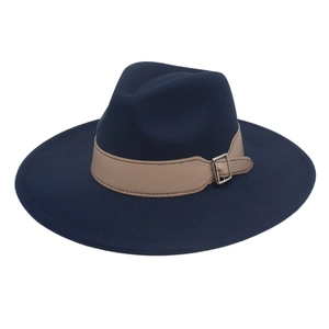 Close-up of wide brim fedora hat with navy wool felt and leather belt buckle strap