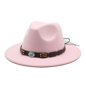 Detail of pink wool felt jazz hat with turquoise stone belt and wide flat brim