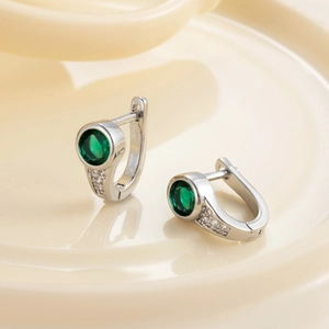 Silver geometric hoop earrings with green gemstone and white zircon accents