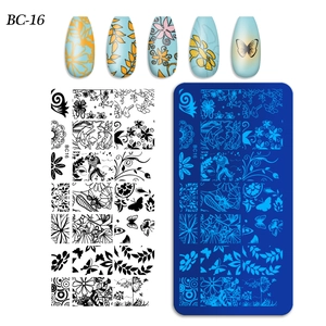 Macro shot of rectangular nail stamping plate BC-16 with floral and butterfly patterns