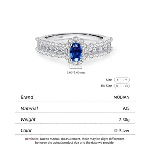 Elegant 925 sterling silver ring featuring an oval blue gemstone with halo diamonds