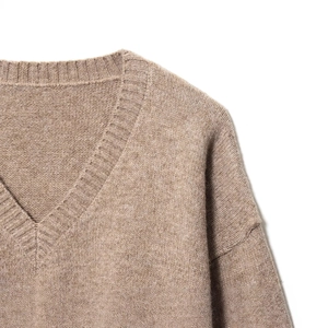 Oatmeal V-neck knit sweater with ribbed trim and drop shoulder design for women