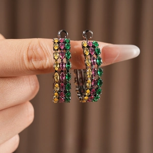 Vintage style hoop earrings with multicolor zircon stones set in dark metal plating
