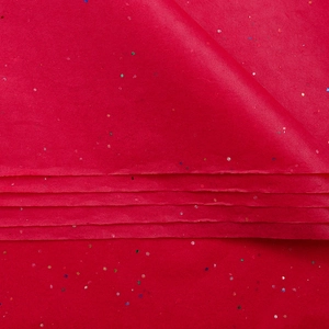 Close-up of red glitter tissue paper showing delicate texture and sparkling flower wrap detail