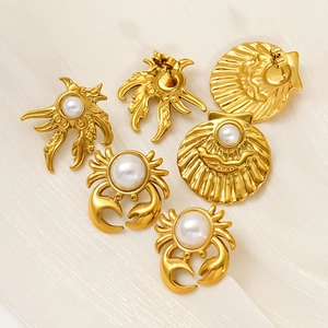 18k gold plated stainless steel ocean earrings set with pearls featuring crab and shell