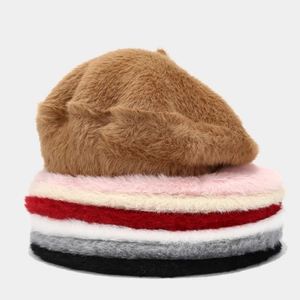 Plush faux mink fur beret hats in multiple colors stacked to show soft furry texture