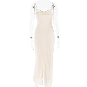 Detailed back view of beige mesh maxi dress featuring ruching and high slit design