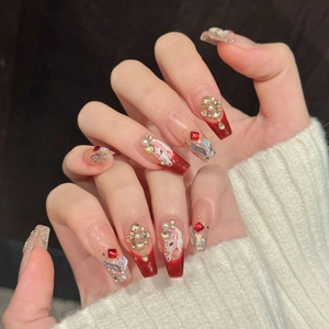 Handmade red French tip press-on nails with 3D gold floral rhinestones and pearls