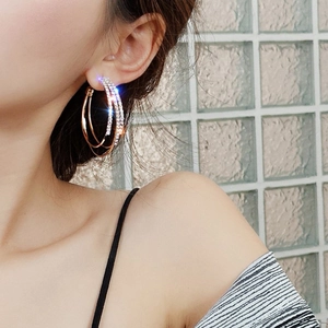 Sparkling triple-layer hoop earrings with crystals and polished gold finish for women