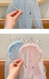 Detail showing blue and pink princess crown headbands with pearls and sparkling tulle veils