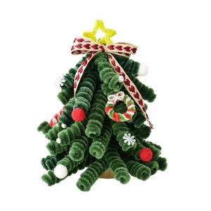 Handmade green chenille stem Christmas tree with mini wreaths, wool balls and yellow star