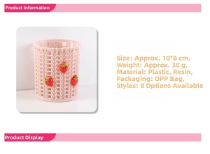 Pink woven texture pen holder with strawberry charms and product size specifications