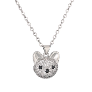 Hip hop style silver puppy pendant necklace with sparkling crystals on white background