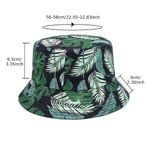Flat top bucket hat with tropical palm leaf print and measurement details for adults