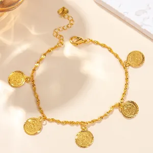 Gold bohemian coin bracelet featuring five round pendants on a twisted rope chain