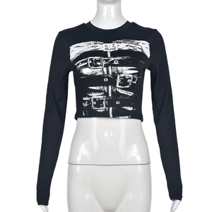 Detail of black long sleeve crop top featuring white belt and buckle pattern print