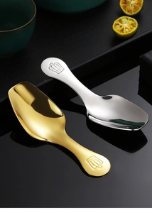 Close-up of 304 stainless steel tea spoons with crown handle detail in gold and silver
