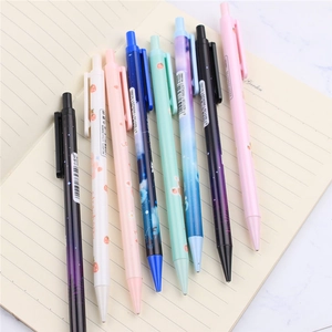 Detailed top view of seven assorted 0.7mm mechanical pencils on an open notebook