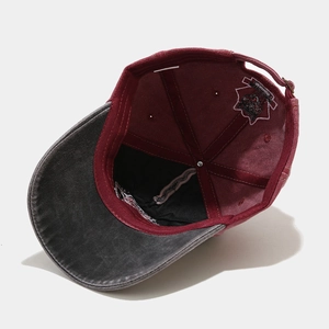 Vintage washed burgundy baseball cap with husky embroidery and adjustable metal buckle