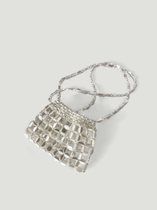 Detail of silver metallic disc sequins and mini beads on handcrafted crossbody bag