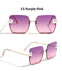 Detail of square gold metal sunglasses with purple pink gradient lenses and pearl accents