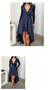 Detail of elegant dark blue long sleeve dress with wrap V-neck and ruffled hemline