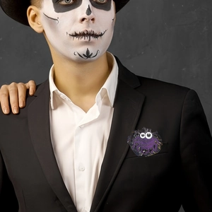 Detail of purple ghost badge reel on black suit with professional Halloween makeup