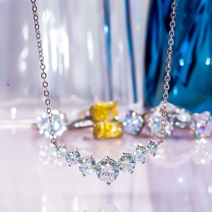 Moissanite smile curved necklace in 925 sterling silver with seven round cut stones