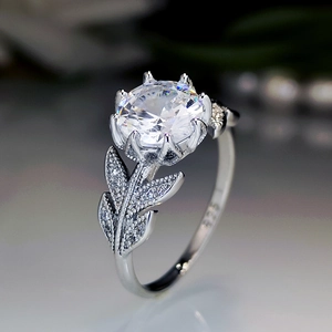 Macro shot of S925 silver flower ring with leaf micro-pave and large round zircon