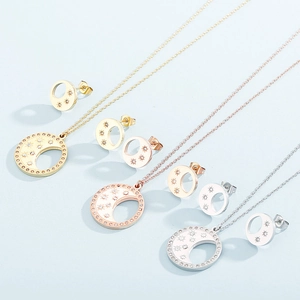 Set gioielli stella e luna con strass lucidi in oro, oro rosa e finitura argento