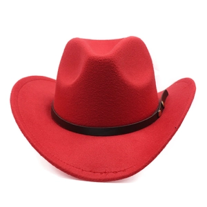 Detailed close-up of red felt cowboy hat with black leather band and metal buckle