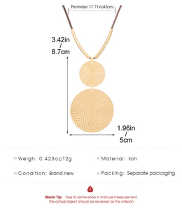 Detail of gold-tone geometric textured round pendant with dimensions and cord necklace