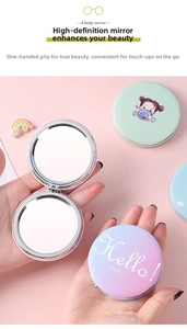 Detail of portable dual-sided folding makeup mirror with pink purple gradient finish