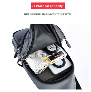 Detailed interior of a grey water-resistant chest bag showing main compartment capacity
