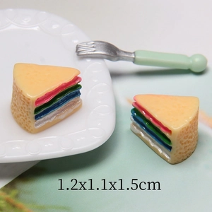 Macro shot of 1.2x1.1x1.5cm resin rainbow cake charms for DIY phone case decoration