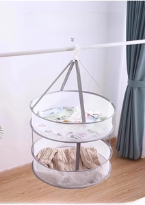 Detail of double-layer hanging drying rack with mesh walls for sweaters and socks