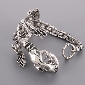 Gothic punk silver dinosaur skeleton bracelet with spinal link chain and claw clasp