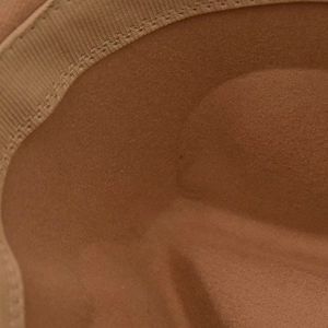Internal structure of tan wool felt fedora hat featuring a stitched sweatband detail