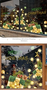 Detail of Christmas window stickers with green gift boxes and Merry Christmas text