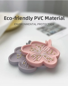 Detailed close-up of cherry blossom PVC soap coasters in elegant pink and gray colors