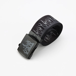 Detail of black canvas belt featuring white flame print and metal buckle closure