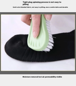 Detail showing anti-pilling test on breathable black cushioned athletic running socks