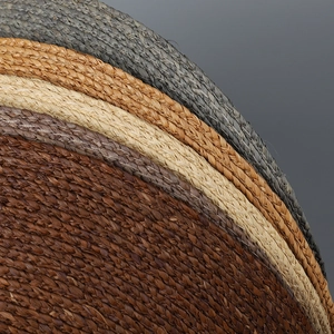 Detailed close-up of woven raffia layers showing diverse natural textures and colors