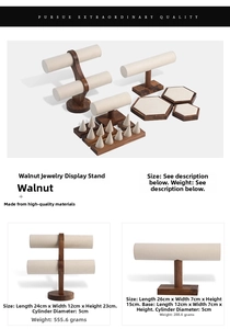 Detail of walnut wood jewelry stand set with beige microfiber display trays and T-bar racks