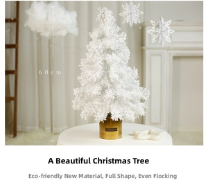 Detailed view of a 60cm white flocked mini Christmas tree with a golden cylindrical base